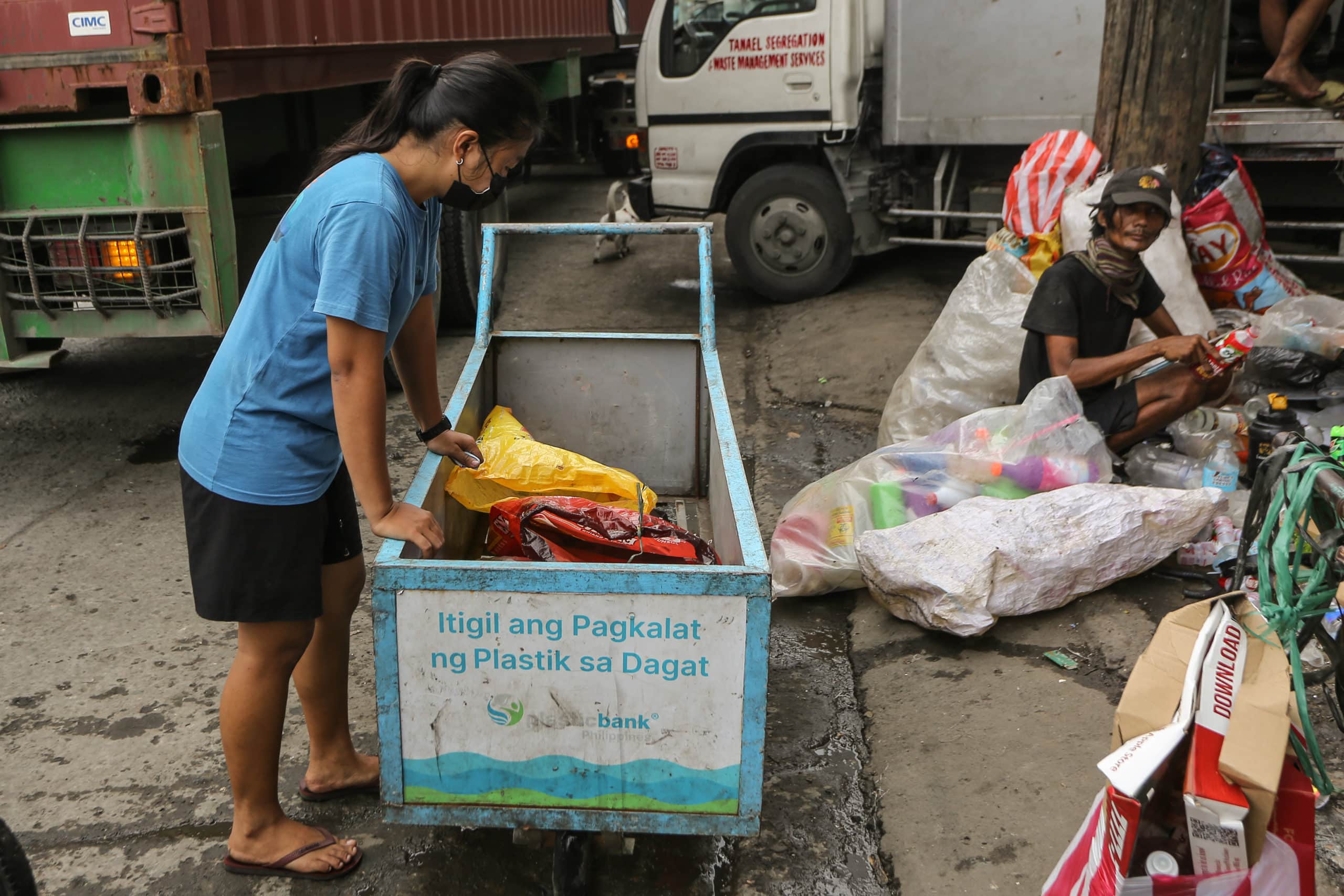 Philippine lady working on sorting plastic