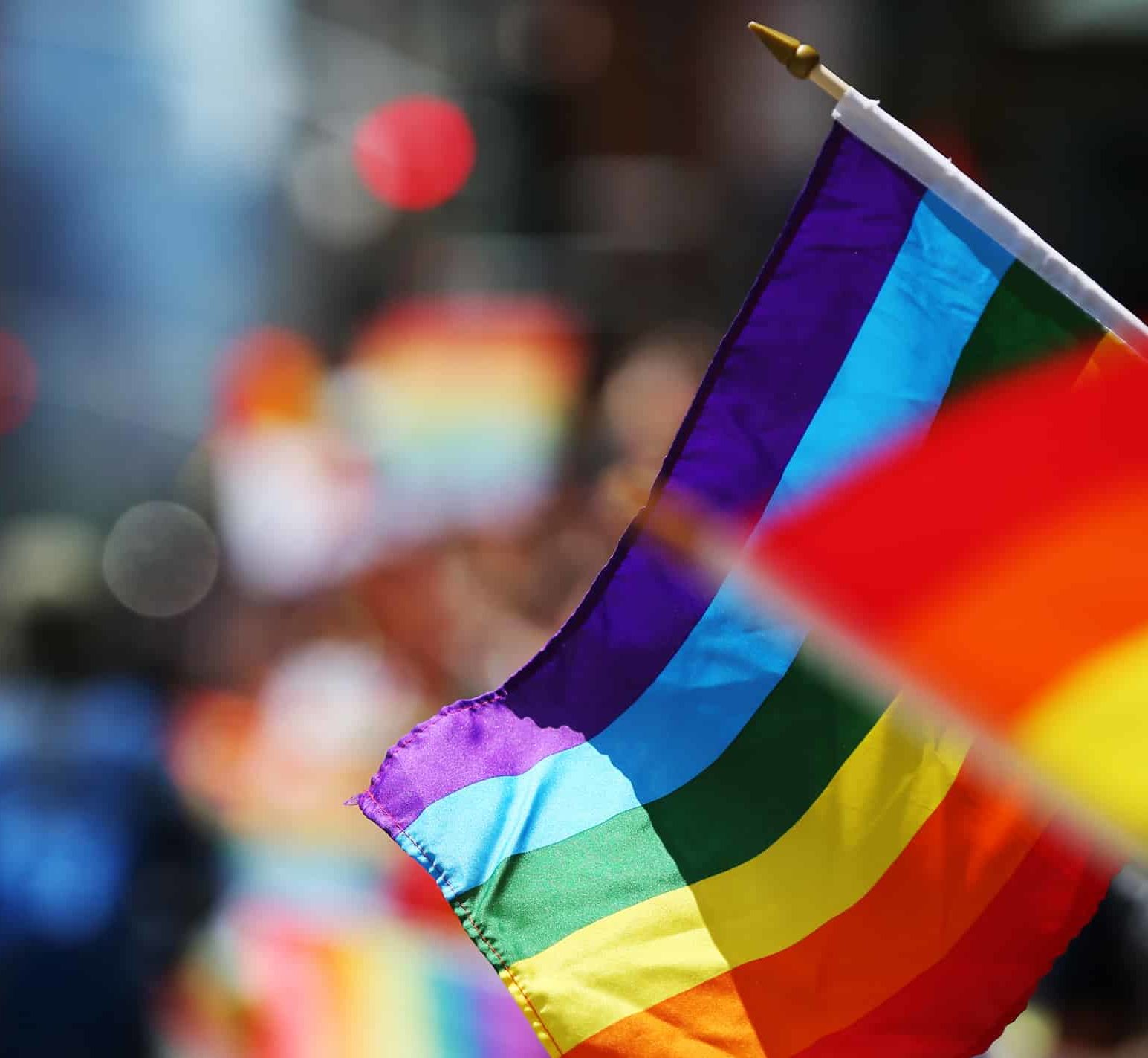 Rainbow flag in a parade