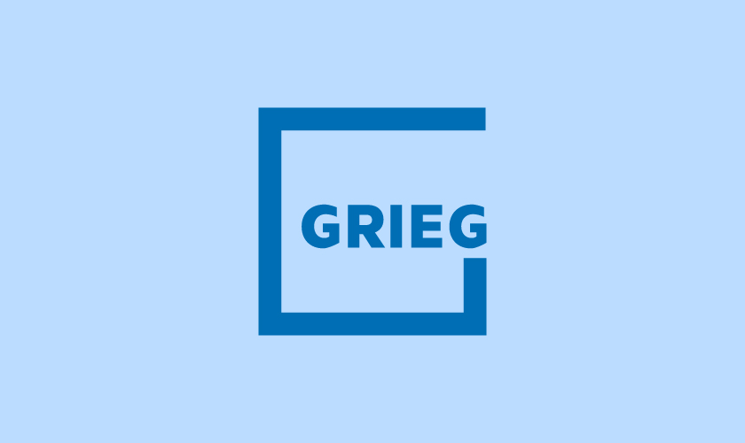 Grieg logo in blue.
