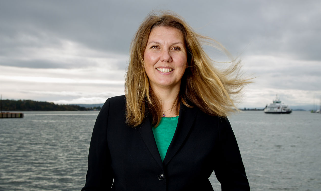 Female employee smiling - Gry Larsen, Leader of Sustainability and Public affairs.